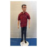 Vintage Mattel Ken doll 1960s, in a distinct red