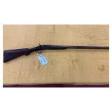 C. Parker 12 gauge double barrel shotgun