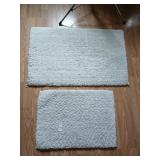 2 matching rugs 17"x24" and 21"x34"