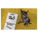 Monet silvertone Owl pin w/ green eyes