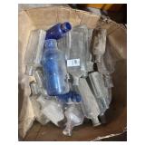 Box of assorted vintage clear and colored bottles