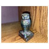 Vintage iridescent carnival glass figurine of an