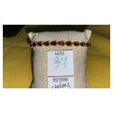 Sterling garnet tennis bracelet