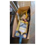 Box of assorted paint brushes