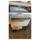 White Frigidaire electronic window mounted air
