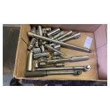 Lot of socket wrenches and sockets