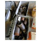 2 boxes of black pipe fittings