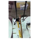 Pot of canes/walking sticks with a back scratcher