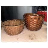 Two woven baskets one with handle