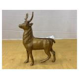 Vintage gold-toned cast iron deer still coin bank