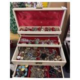 Multi-tier cream jewelry box with costume jewelry