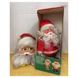 Two vintage musical santas
