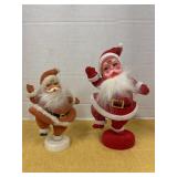 Two vintage flocked dancing santa figurines