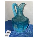 Vintage blue opalescent glass cruet in the Wild