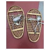Vintage wooden bear paw style torpedo snowshoes