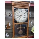 E. Ingraham Co.-calendar box regulator wall clock