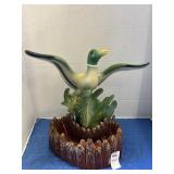 Vintage ceramic mallard duck in flight with a