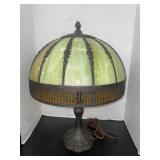 Antique Slag  glass table lamp featuring curved