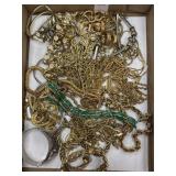Lot of mostly gold tone costume jewelry