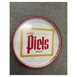 Piels circular metal beer sign