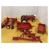 Vintage ERTL tractor model toy with attachments