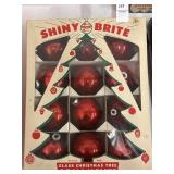 Vintage red Christmas bulbs in Shiny Brite box