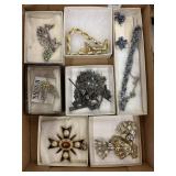 Flat of costume jewelry