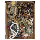 Flat of costume jewelry and souvenir thermometers