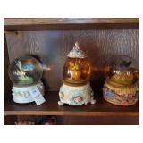 3 globe style music boxes