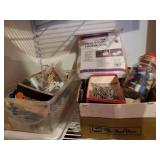 Box of drapery hooks, jar of thread, heel/elbow
