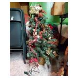 Decorated faux Christmas tree with lights