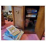 All books in console table and floor