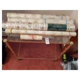 Little glass vanity table & wallpaper rolls