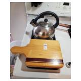 Teapot & wooden cutting board