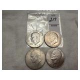 Four Eisenhower "Ike" one-dollar coins
