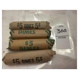 Four rolls of nonspecific U.S. dimes