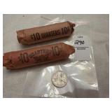 Two rolls of US centennial quarters