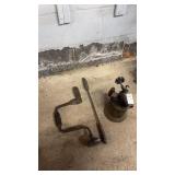 Vintage brass and metal gasoline blow torch and a