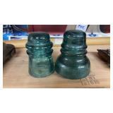 Two Green Glass Insulators