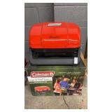 Coleman table top propane grill featuring a