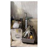 Lot of zip ties, industrial sprays, caulking gun,