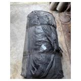 Black tarp unknown size *tears*