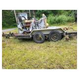Small car trailer has title with International