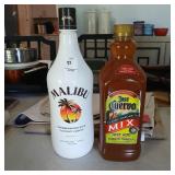 Opened 1/2 full bottle of Malibu and unopened