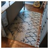 63" wide, 85" long area rug