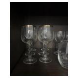 Lot of assorted glasses and kitchen tools