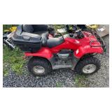 Red Honda FourTrax Recon utility ATV equipped