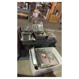 Lot of stainless steel food organizers and pans
