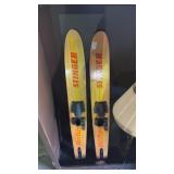 Pair of vintage Stinger wooden water skis with