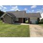Three bedroom, two baths, Cape Cod style brick